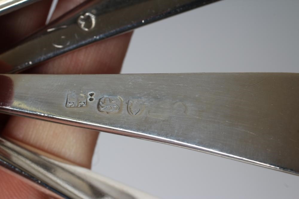 A COLLECTION OF SILVER FLATWARE comprising twelve teaspoons Image