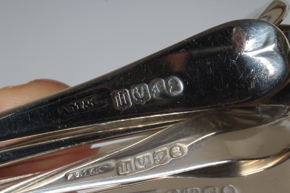 A COLLECTION OF SILVER FLATWARE comprising twelve teaspoons Image
