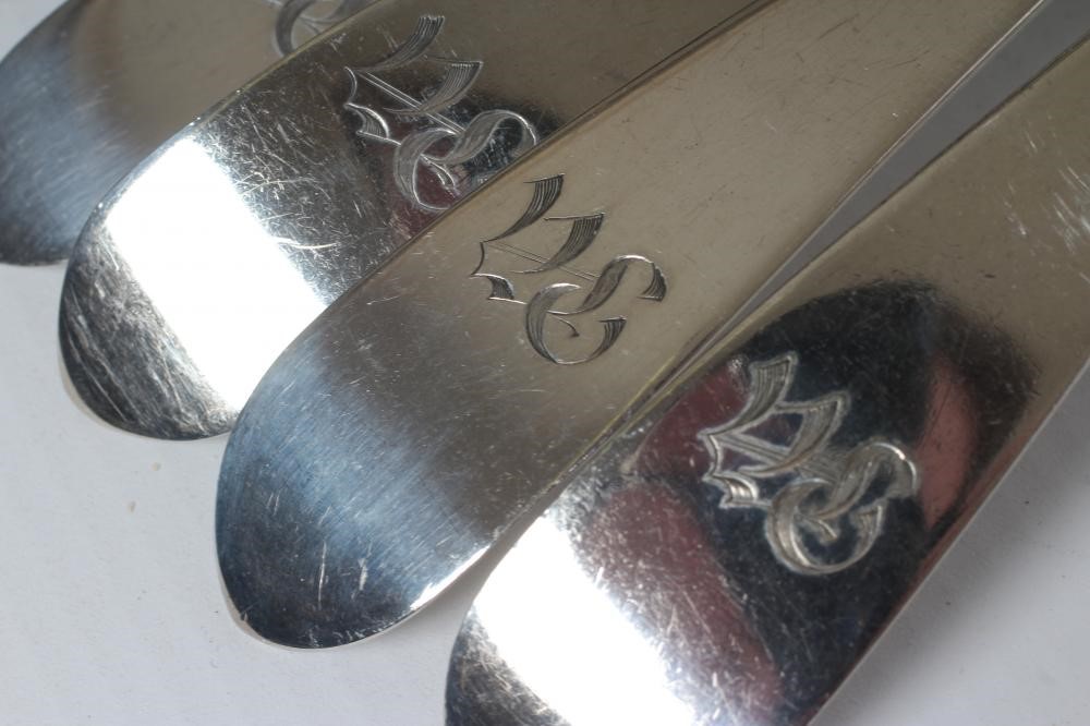 A SET OF EIGHT GEORGE III SILVER TABLESPOONS Image