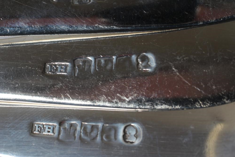 A SET OF EIGHT GEORGE III SILVER TABLESPOONS Image