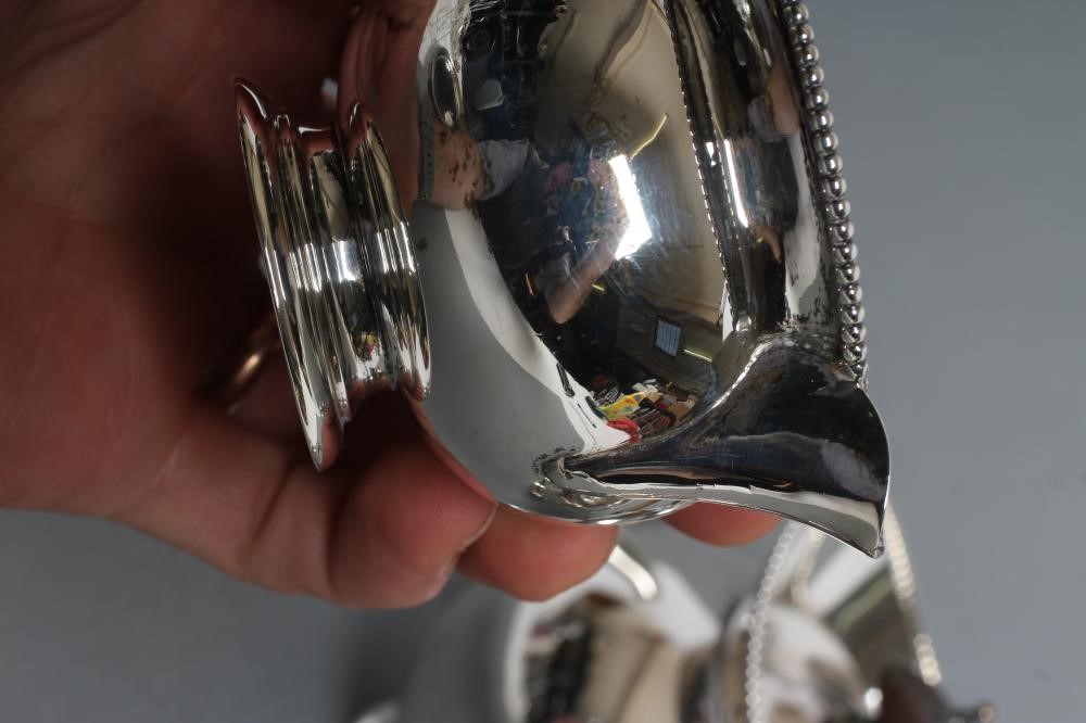 A LATE VICTORIAN SILVER THREE PIECE BACHELOR'S TEA SERVICE Image