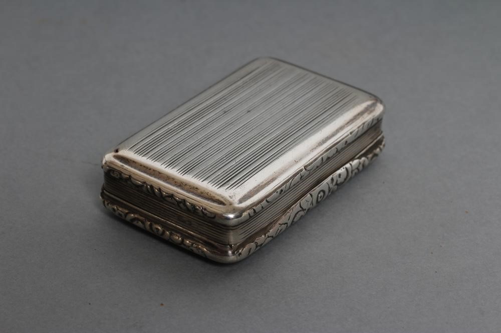 A GEORGE III SILVER SNUFF BOX Image