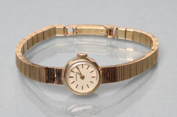 A LADY'S 9CT GOLD LONGINES WRISTWATCH Image