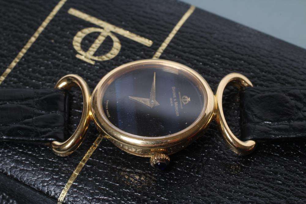 A LADY'S 18CT GOLD BAUME & MERCIER WRISTWATCH with blue ombre dial Image