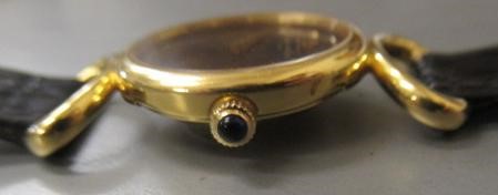 A LADY'S 18CT GOLD BAUME & MERCIER WRISTWATCH with blue ombre dial Image