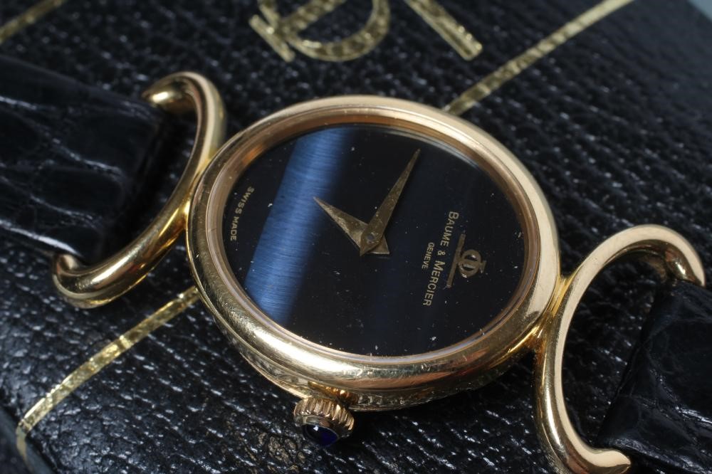 A LADY'S 18CT GOLD BAUME & MERCIER WRISTWATCH with blue ombre dial Image