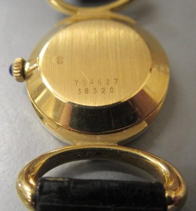 A LADY'S 18CT GOLD BAUME & MERCIER WRISTWATCH with blue ombre dial Image