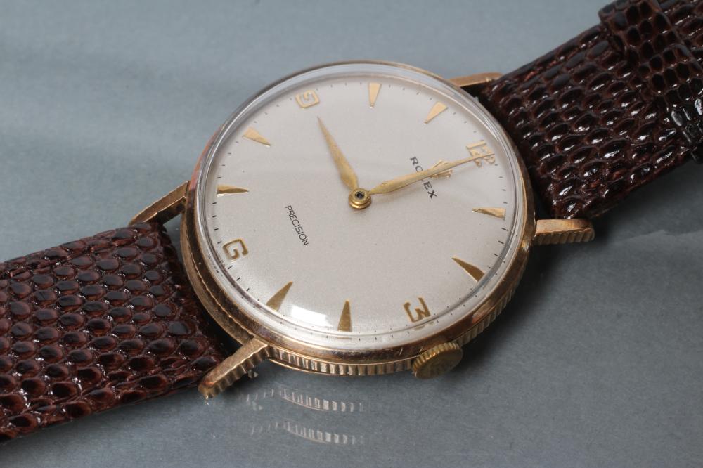A GENTLEMAN'S 9CT GOLD ROLEX PRECISION WRISTWATCH Image