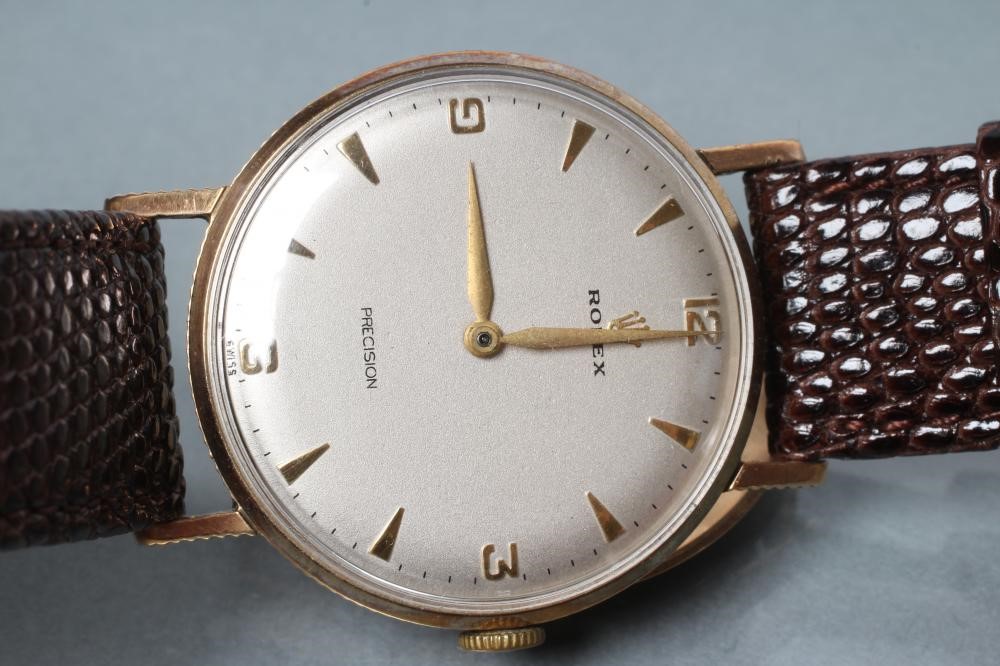 A GENTLEMAN'S 9CT GOLD ROLEX PRECISION WRISTWATCH Image