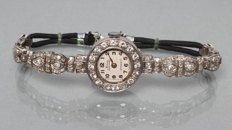 A DIAMOND COCKTAIL WATCH Image