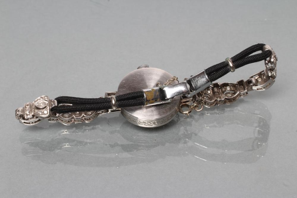 A DIAMOND COCKTAIL WATCH Image