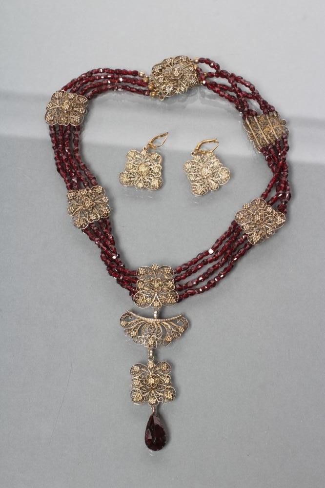 A BOHEMIAN GARNET BEAD FOUR STRING NECKLACE Image