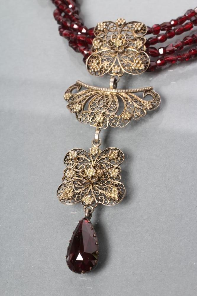 A BOHEMIAN GARNET BEAD FOUR STRING NECKLACE Image