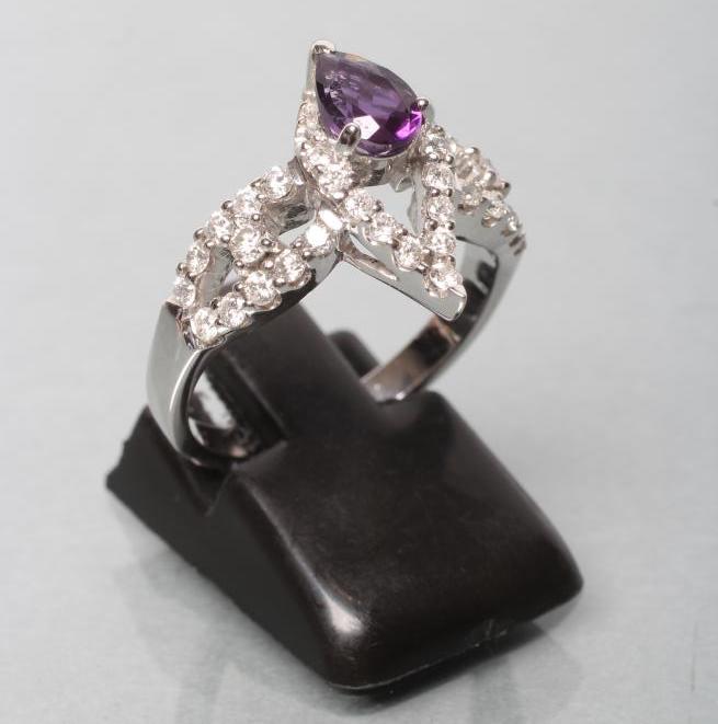 AN AMETHYST AND DIAMOND COCKTAIL RING Image