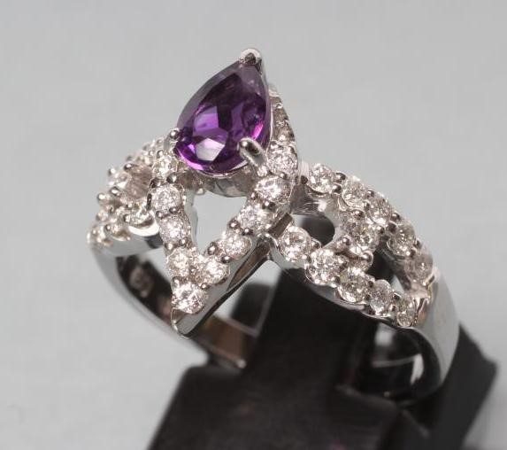 AN AMETHYST AND DIAMOND COCKTAIL RING Image