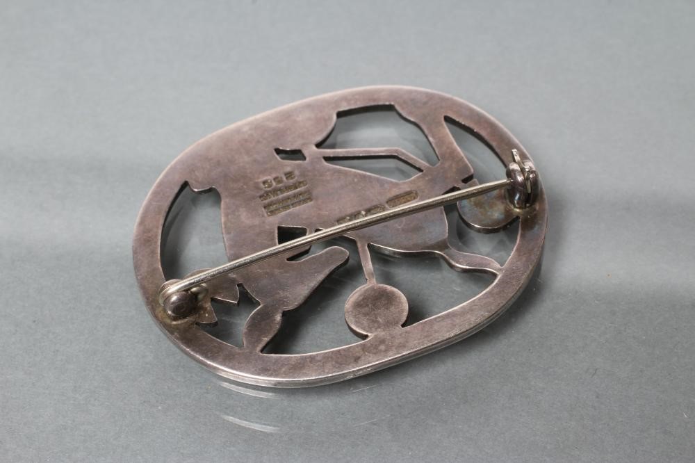 A GEORG JENSEN SILVER KNEELING DEER BROOCH Image