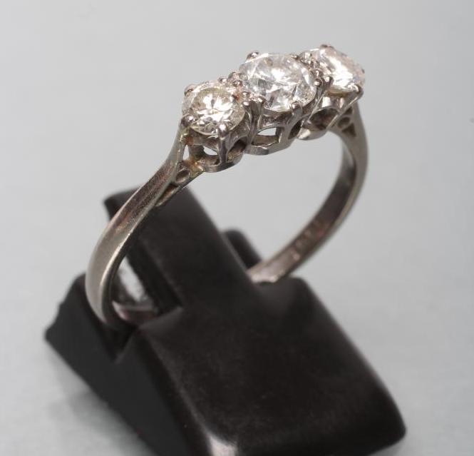 A THREE STONE DIAMOND RING Image