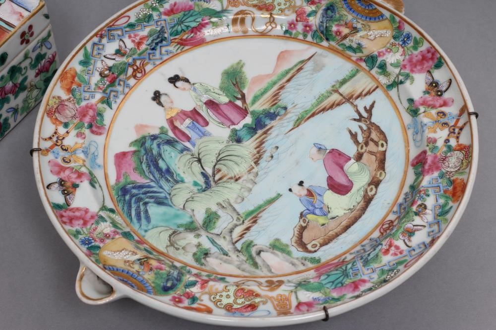 A CANTONESE PORCELAIN WARMING DISH of circular form with two small spouts Image