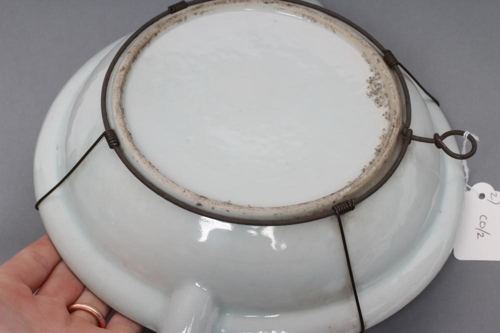 A CANTONESE PORCELAIN WARMING DISH of circular form with two small spouts Image