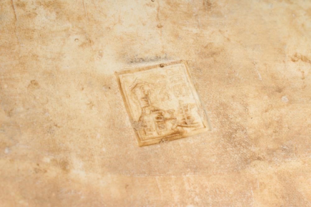 A CHINESE PORCELAIN FIGURE modelled as a celestial warrior wearing brightly coloured robes holding a Image