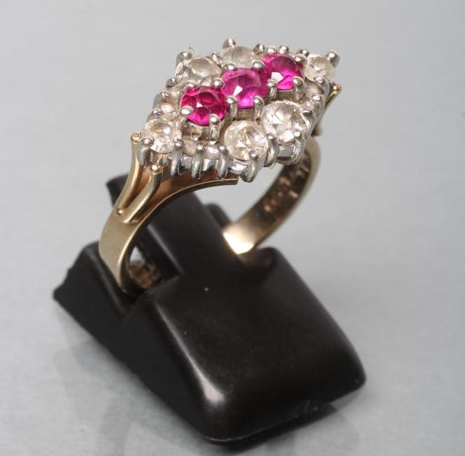 A RUBY AND DIAMOND CLUSTER RING Image
