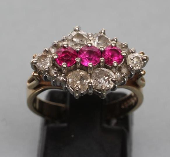 A RUBY AND DIAMOND CLUSTER RING Image