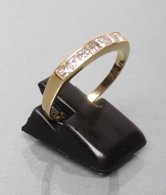 A DIAMOND HALF HOOP ETERNITY RING Image