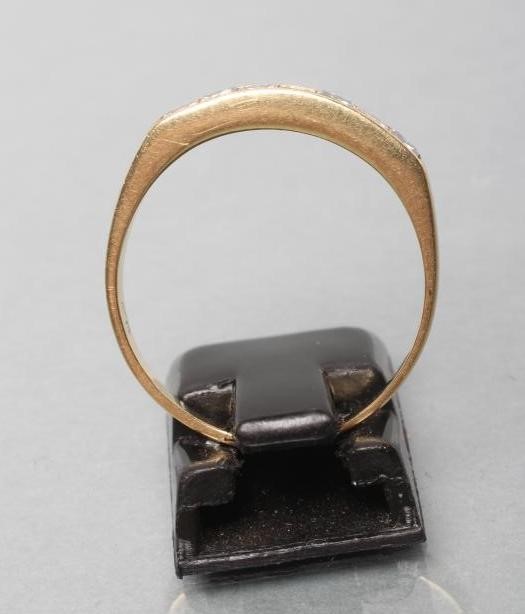 A DIAMOND HALF HOOP ETERNITY RING Image