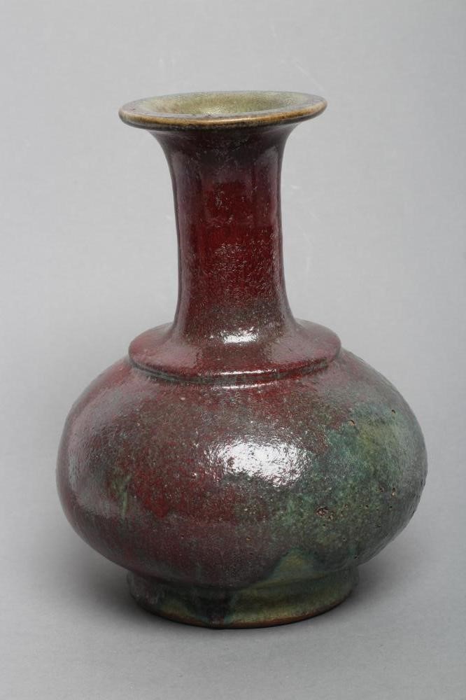 A CHINESE STONEWARE VASE of double gourd form in a sang de boeuf glaze Image