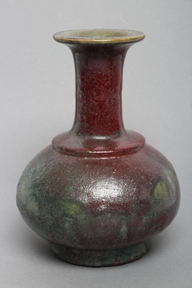 A CHINESE STONEWARE VASE of double gourd form in a sang de boeuf glaze Image