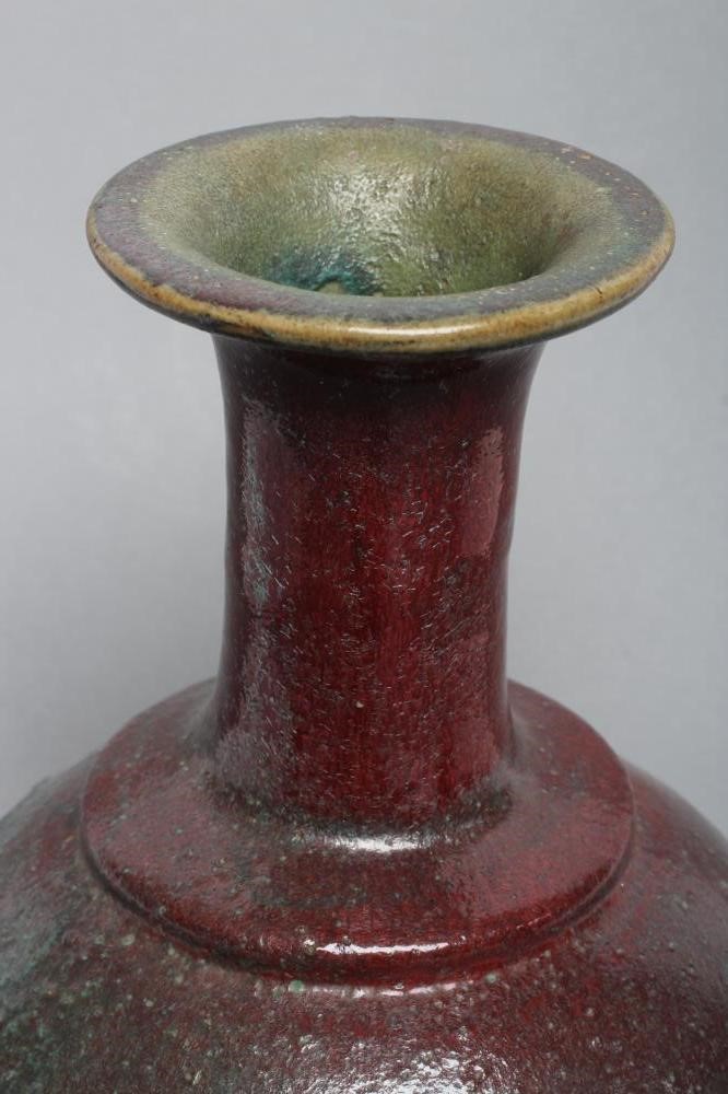 A CHINESE STONEWARE VASE of double gourd form in a sang de boeuf glaze Image