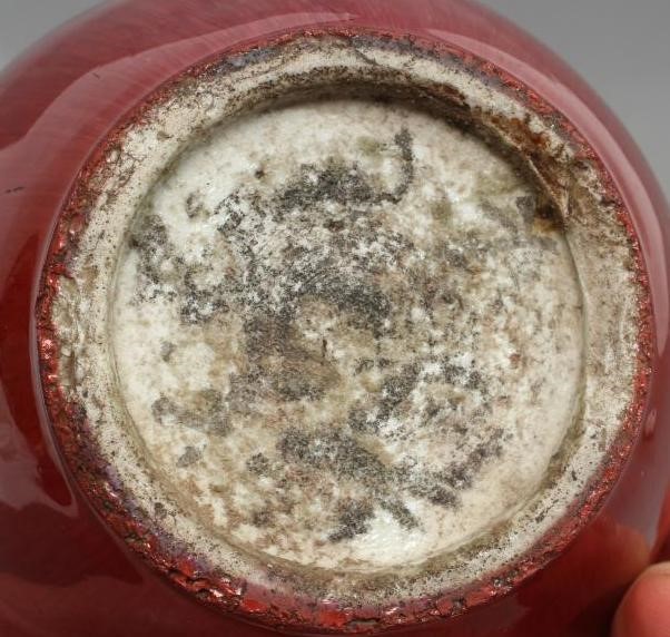 A CHINESE STONEWARE VASE of double gourd form in a sang de boeuf glaze Image