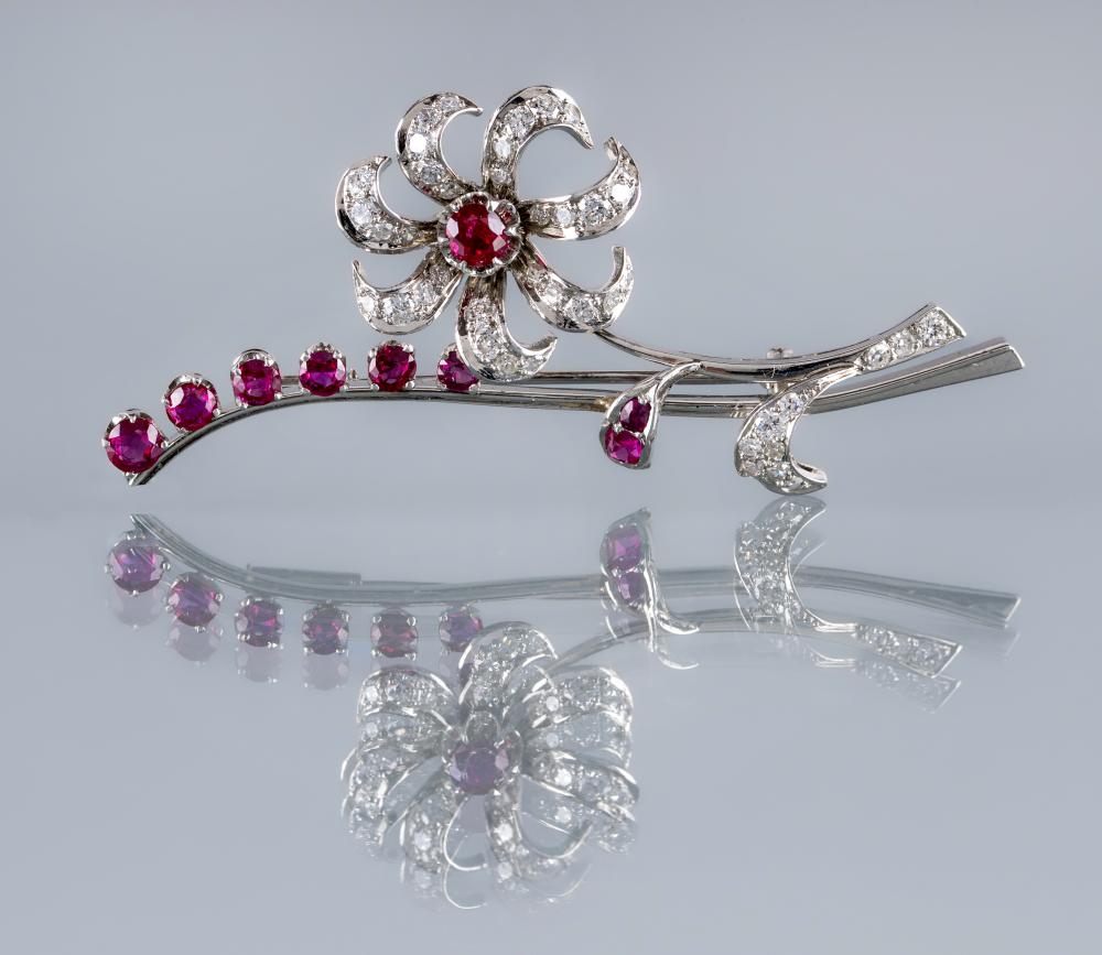 A RUBY AND DIAMOND SPRAY BROOCH Image