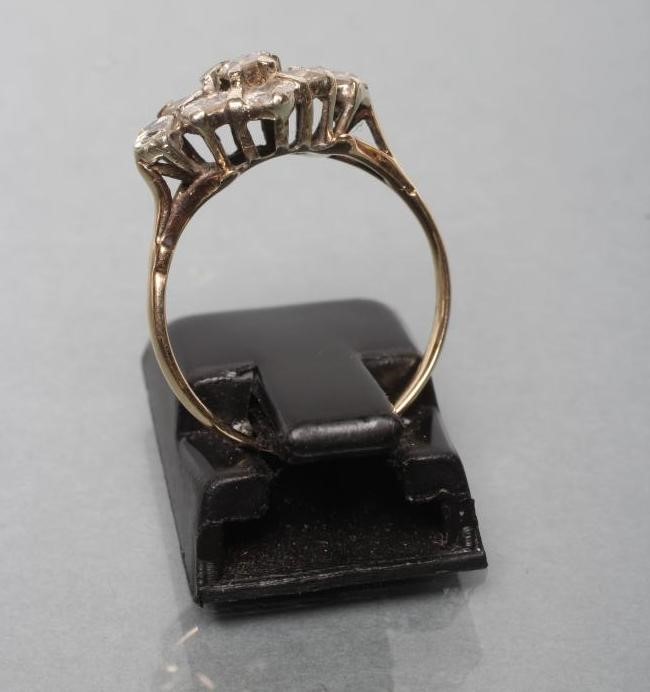 A NINE STONE DIAMOND CLUSTER RING Image