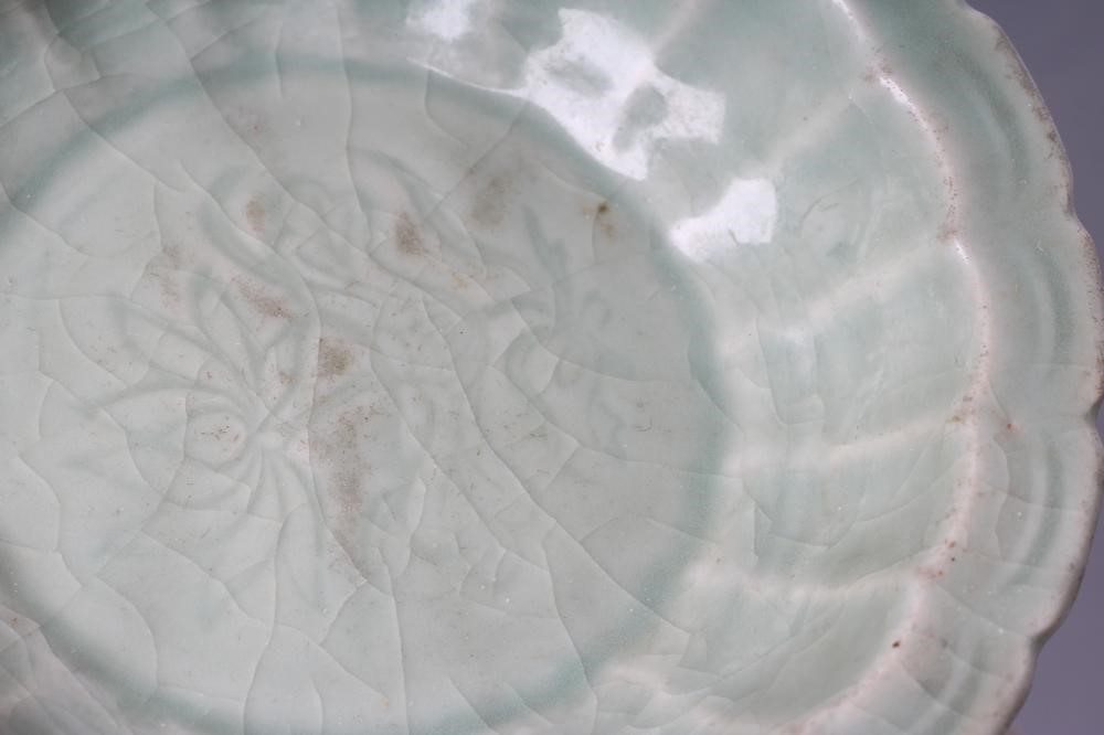 A CHINESE CELADON GLAZED SMALL DISH of lobed circular form Image
