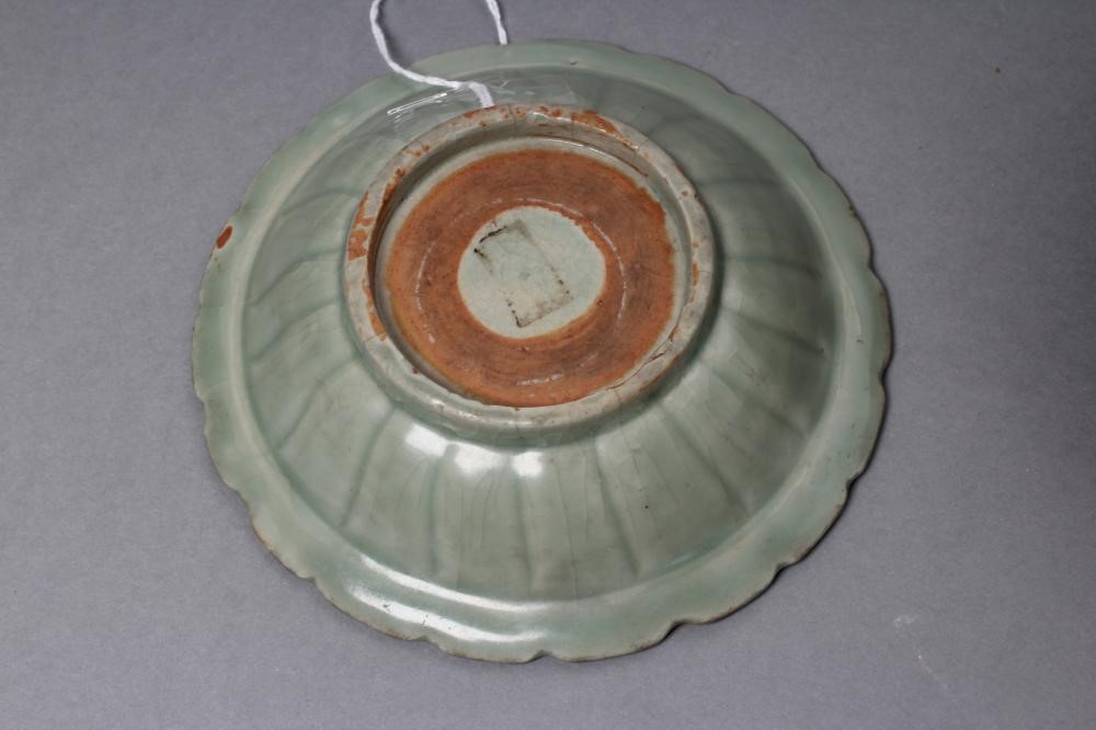 A CHINESE CELADON GLAZED SMALL DISH of lobed circular form Image