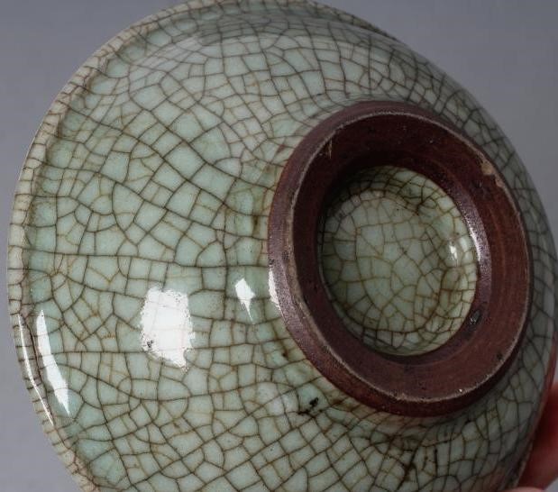 A CHINESE CELADON GLAZED SMALL DISH of lobed circular form Image