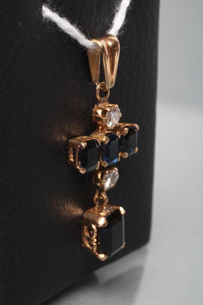 A SAPPHIRE AND DIAMOND DROP PENDANT Image