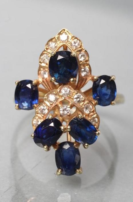 A SAPPHIRE AND DIAMOND DRESS RING Image