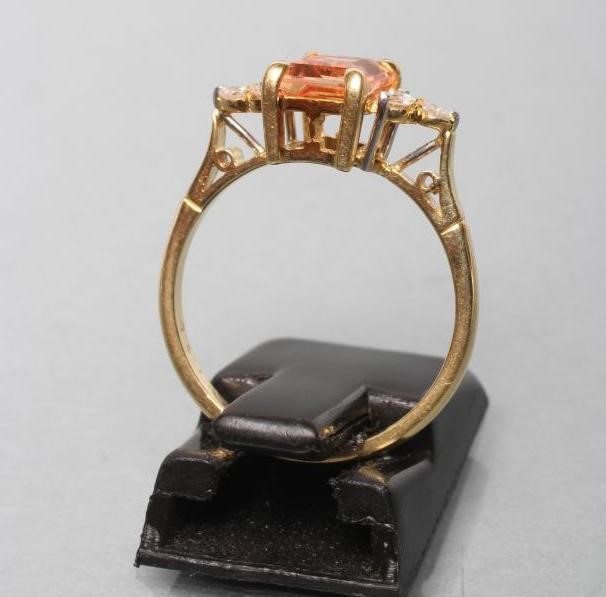 A TOPAZ AND DIAMOND DRESS RING Image