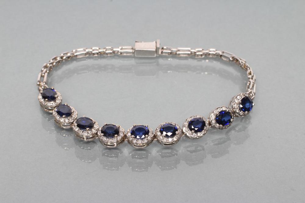 A SYNTHETIC SAPPHIRE AND DIAMOND BRACELET Image