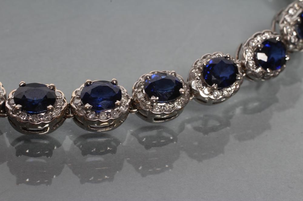 A SYNTHETIC SAPPHIRE AND DIAMOND BRACELET Image