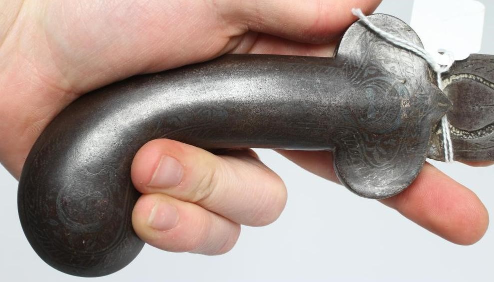 A SHAMSHIR with 26 3/4" curved blade and brass hilt with scalloped grip and lion head pommel Image