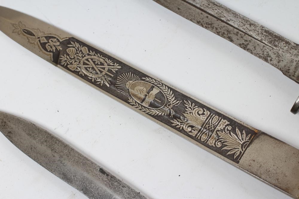 A COLLECTION OF THREE DAGGERS Image