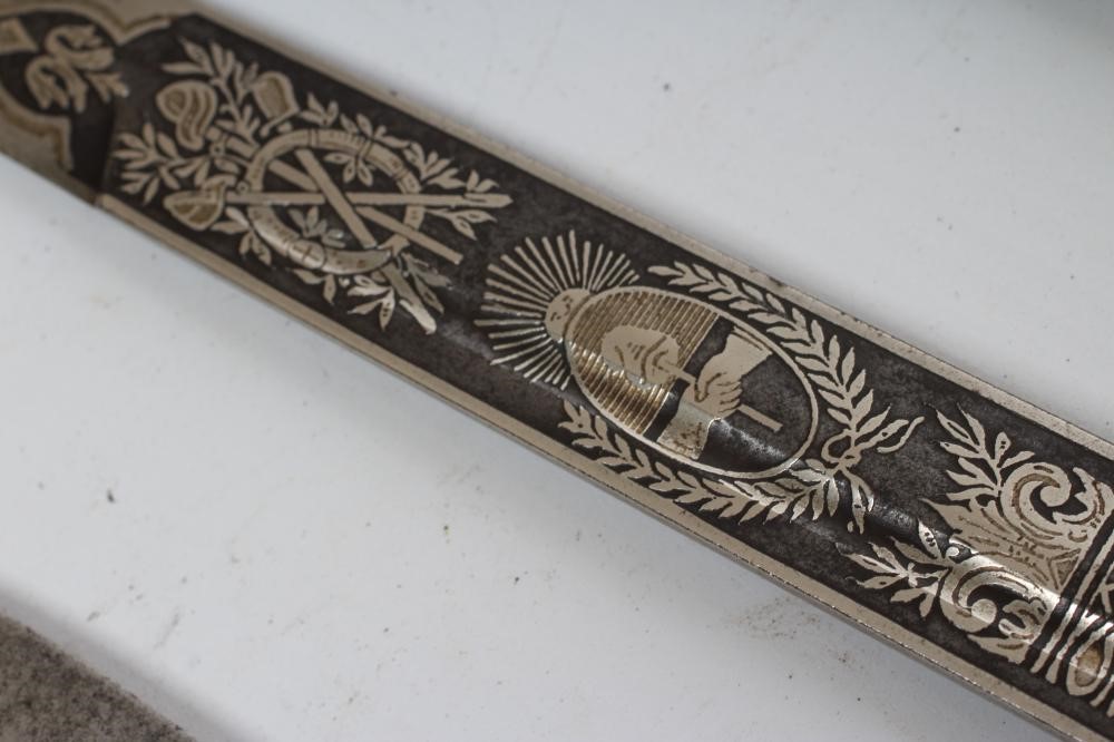 A COLLECTION OF THREE DAGGERS Image