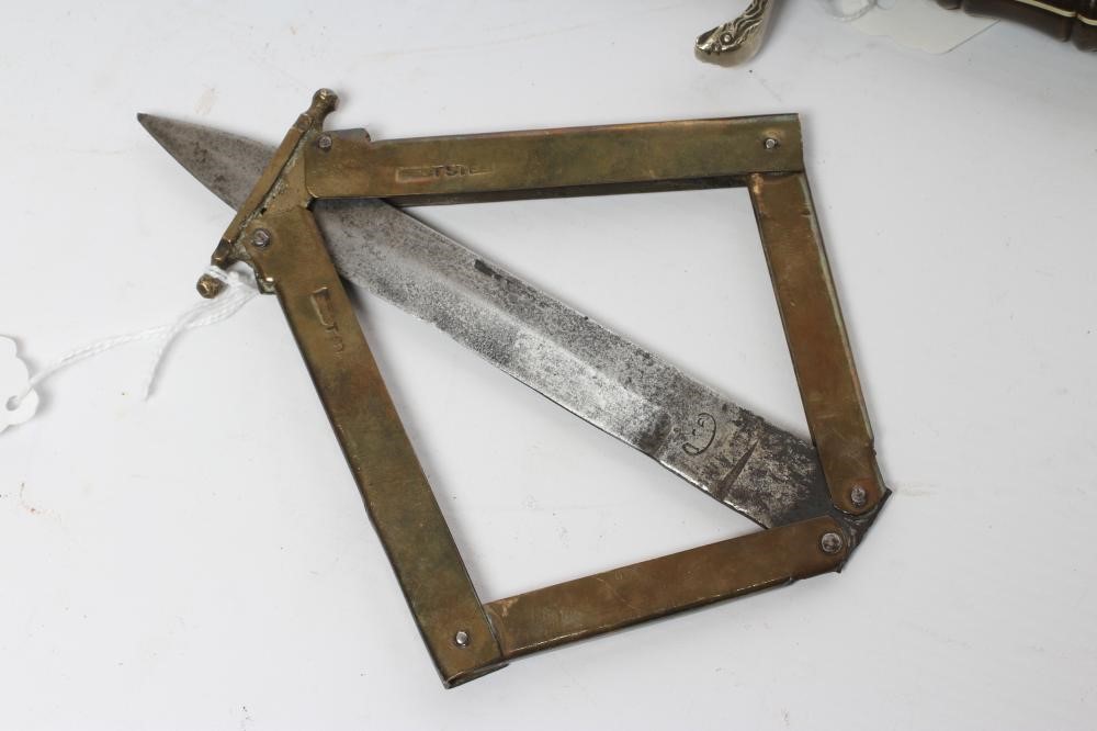 A COLLECTION OF THREE DAGGERS Image