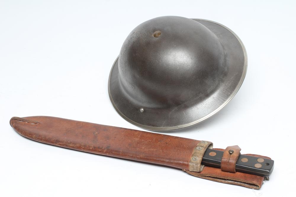 A BRITISH WWI HELMET with faux leather webbing Image