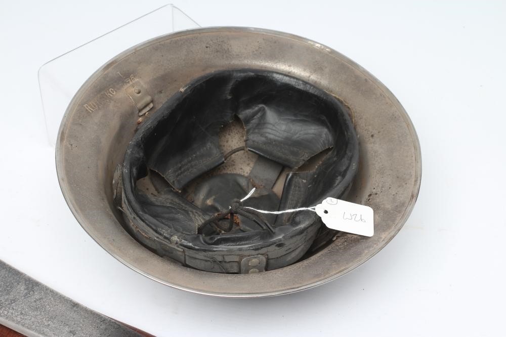 A BRITISH WWI HELMET with faux leather webbing Image