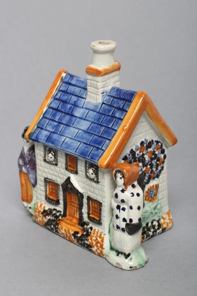 A MEXBOROUGH TYPE PRATTWARE PEARLWARE MONEY BOX Image