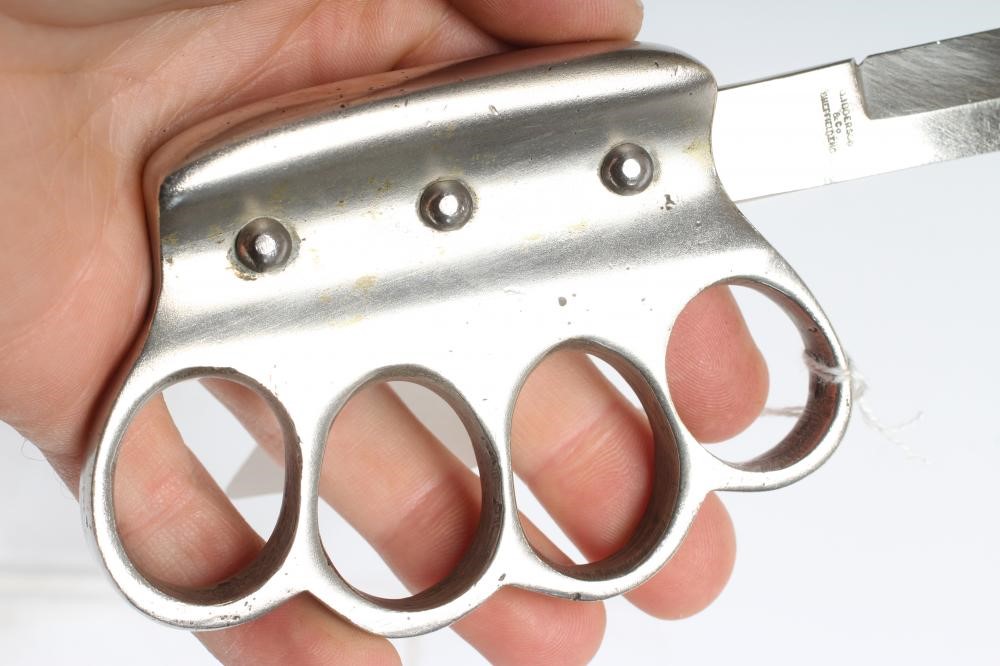 A WWI CLEMENTS KNUCKLE DUSTER KNIFE with 5" clip point blade Image